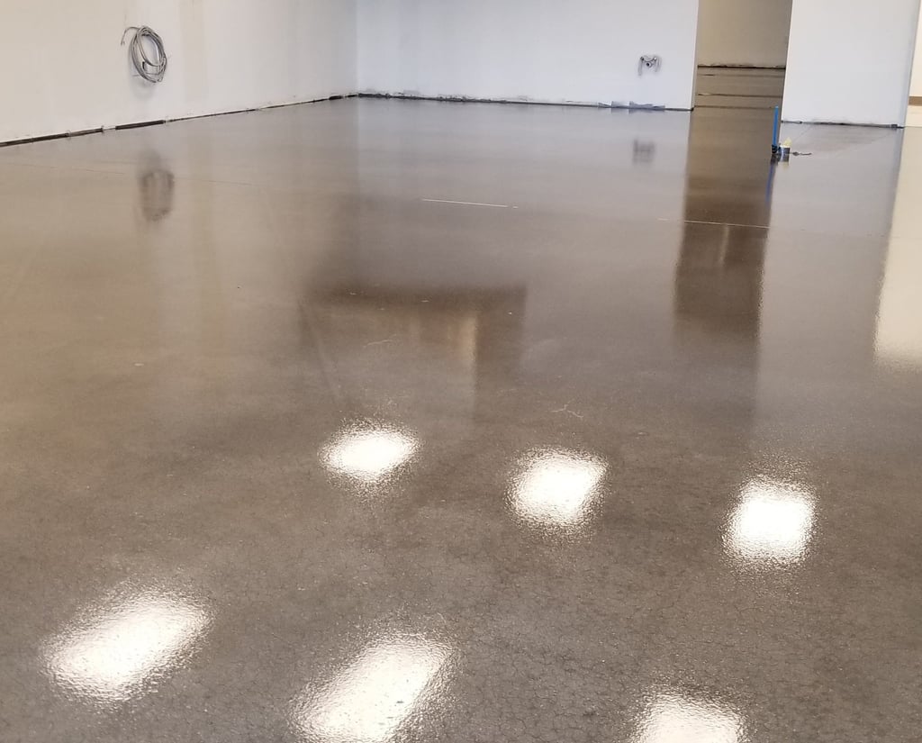 Decorative painted concrete floor in a finished space